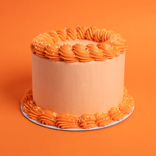 Dressed Cake Orange Piped
